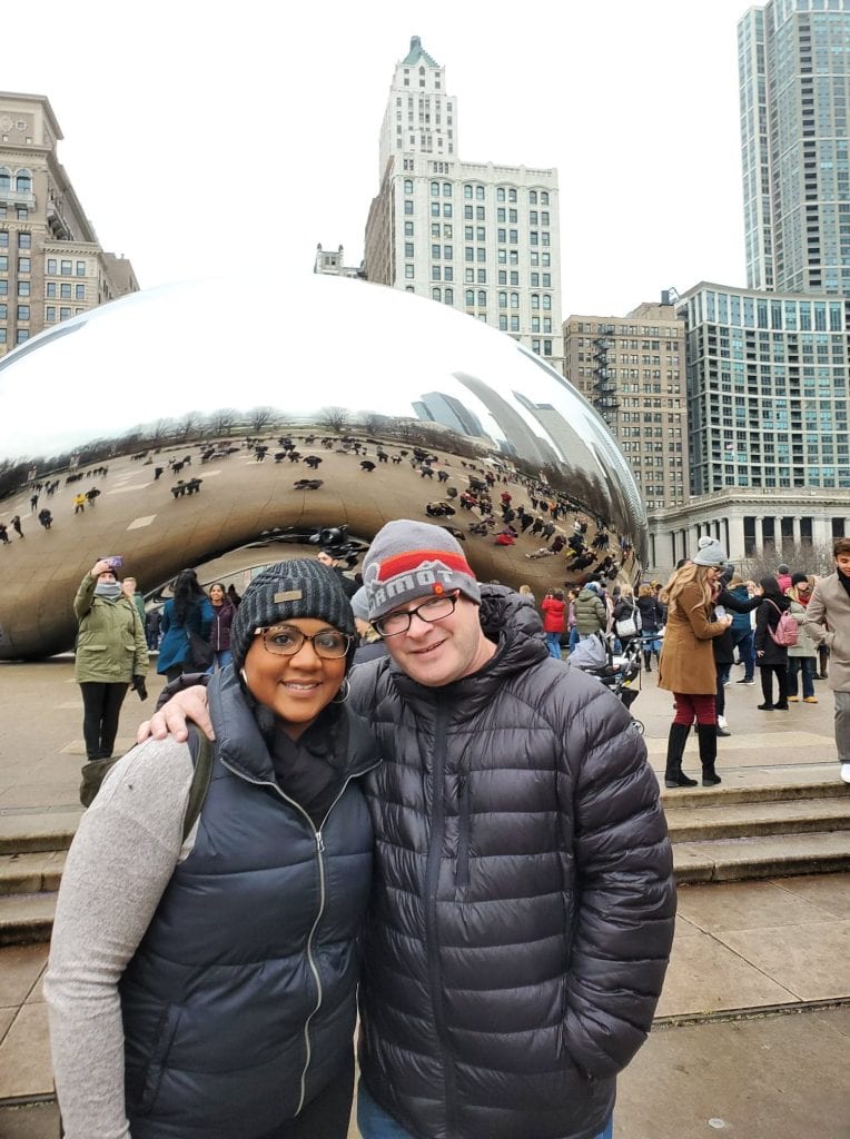 Posing for an Instagram photo at the Bean in Chicago