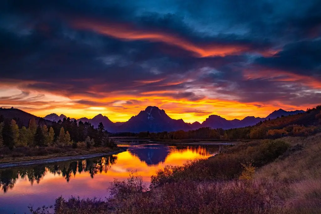 Oxbow Bend در پارک ملی Grand Teton در غروب آفتاب